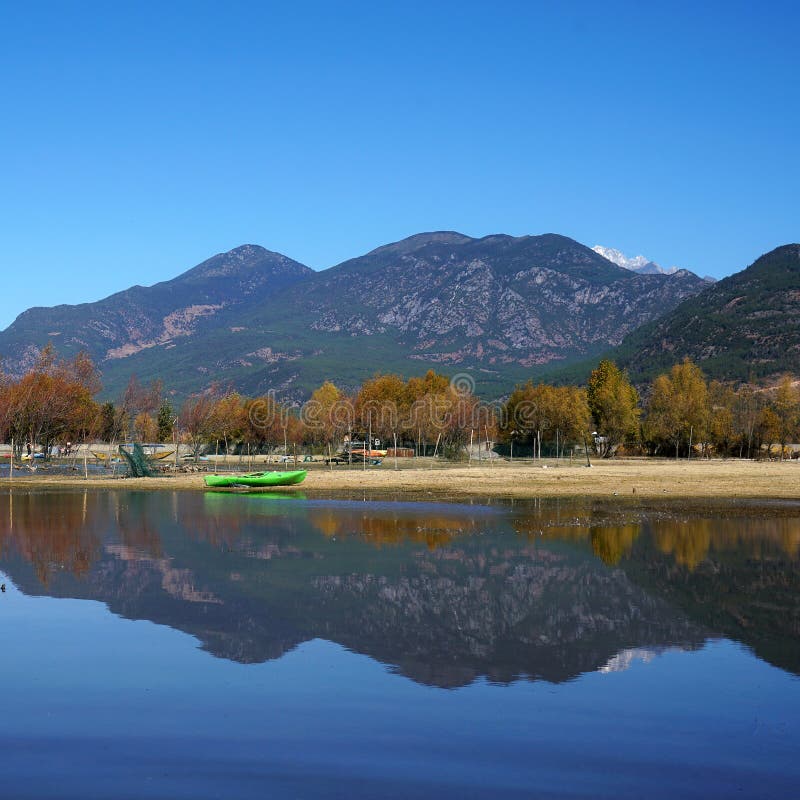 Boat in Lake in Autumn