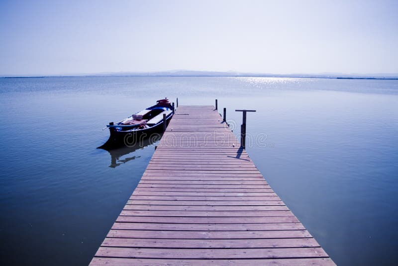 Boat in the lake II stock image. Image of canoeing, horizontal 3456777