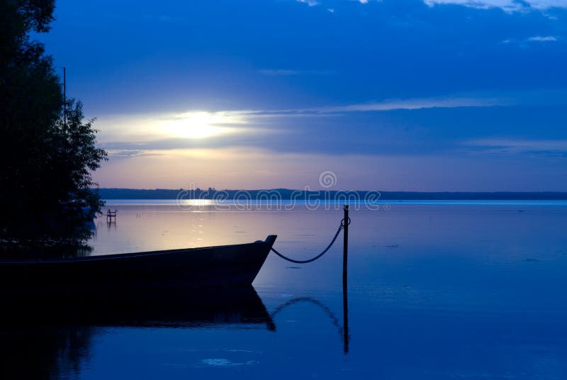 Boat and lake at twilight