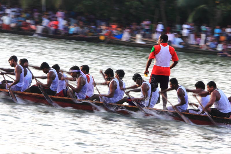 Oarsmen of a participating snake boat team moving fast in the Kallada Boat race on September 26, 2012 in Kallada, Kerala, India. Oarsmen of a participating snake boat team moving fast in the Kallada Boat race on September 26, 2012 in Kallada, Kerala, India.