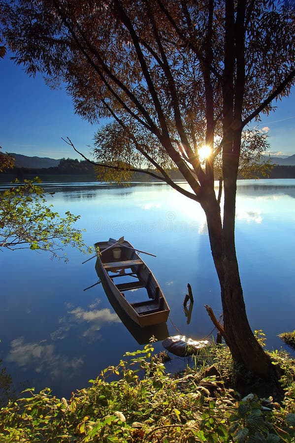 Boat on the river stock photo. Image of countryside, shore ...