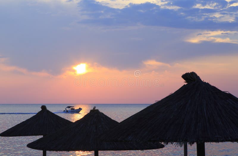 Boat in the sea and sunset.