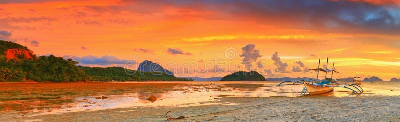 Boat at sunset royalty free stock photos