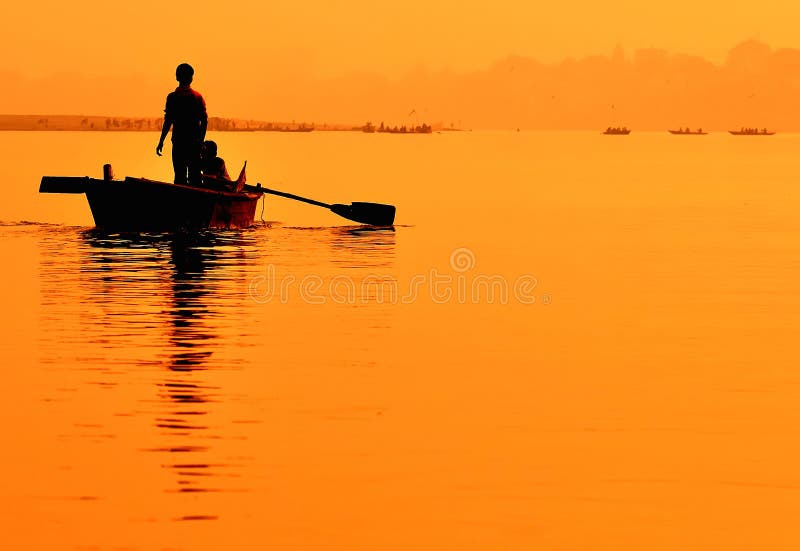 Boat on sunset. Ganges in Varanasi.