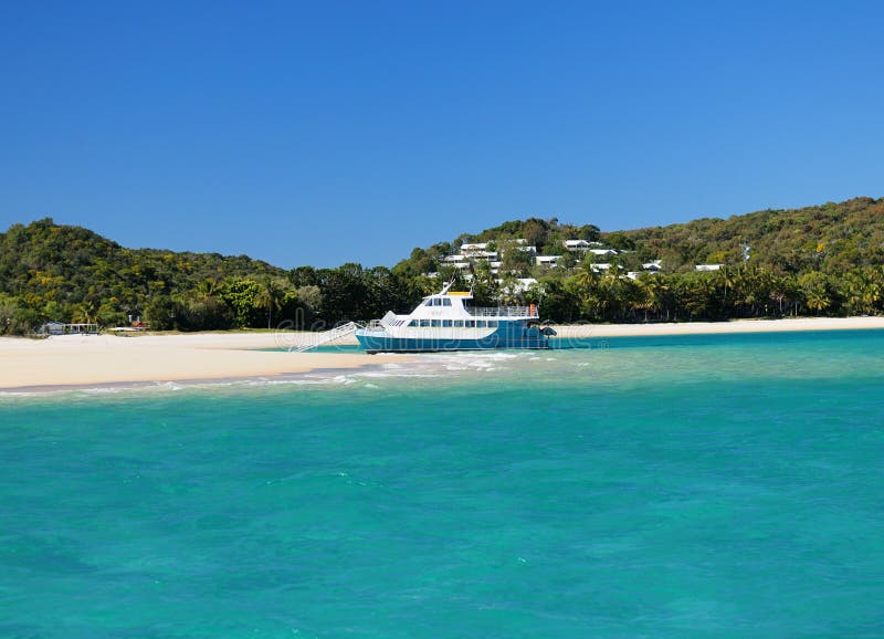 Boat in the Turquoise Water of the Tropical Bay of Great Keppel Island ...