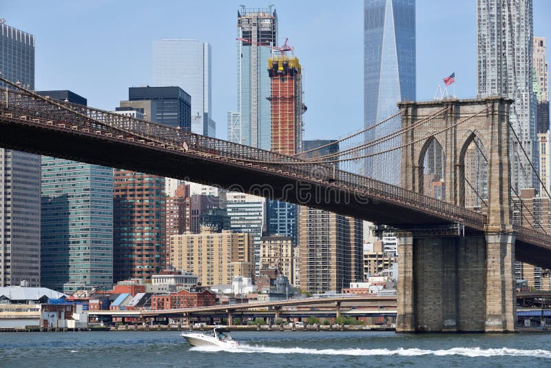 Boat under Brooklyn Bridge editorial image. Image of massive - 102995170