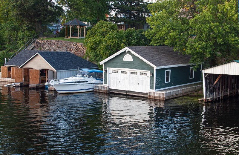 Boathouses on a river