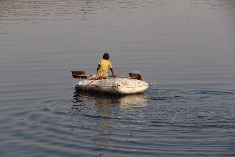 boating in yamuna river editorial stock image. image of