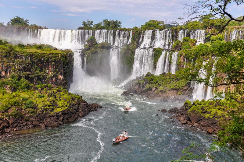 Boats around Iguazu Falls, Argentina. Boats around Iguazu Falls, one of the New Seven Wonders of Nature, Argentina royalty free stock image Boats around Iguazu Falls, Argentina. Boats around Iguazu Falls, one of the New Seven Wonders of Nature, Argentina royalty free stock image