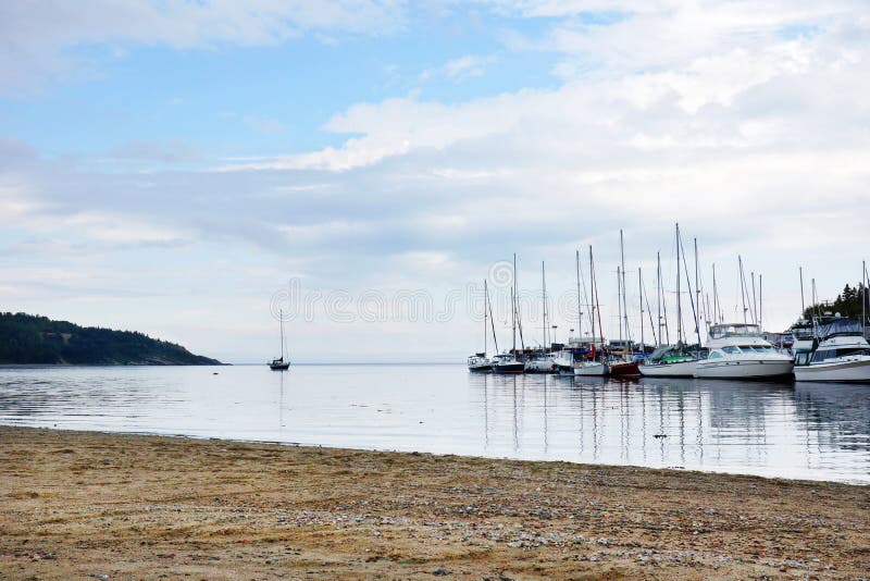 Boats in the harbor and beach