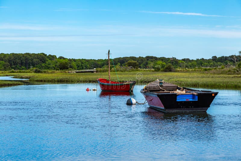 Boats on Herring River stock image. Image of blue, green 89485171