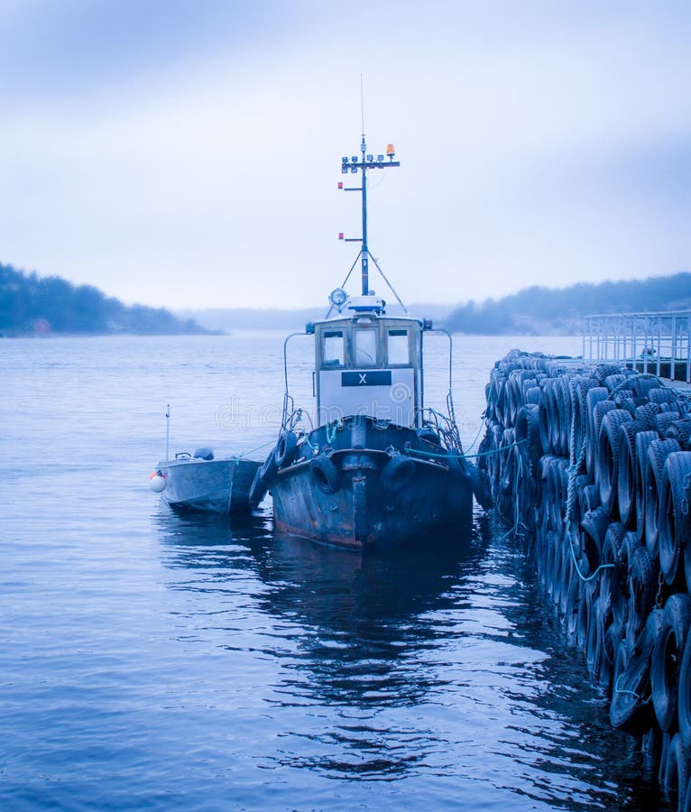 Boats by a Jetty in the fjord