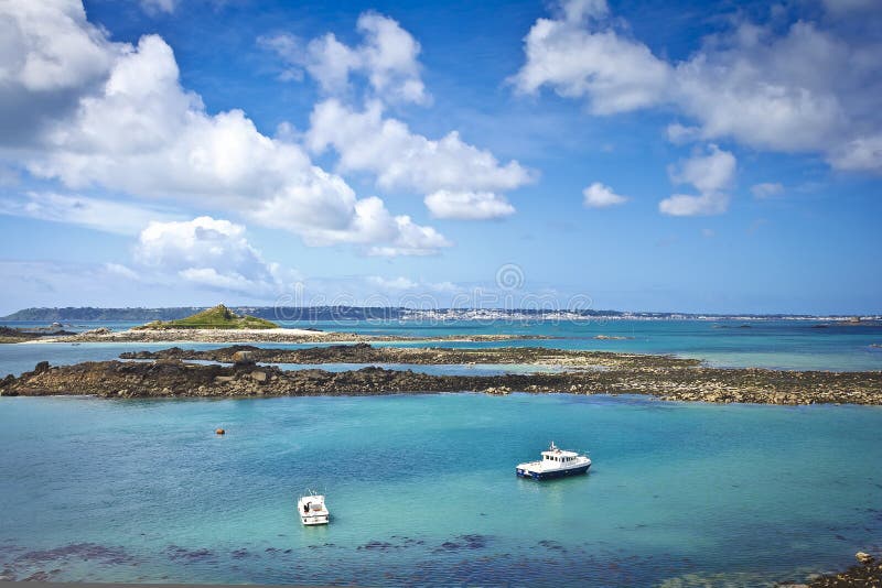 boats low tide herm channel islands uk