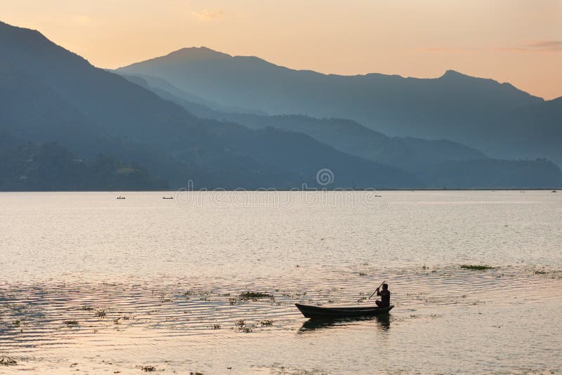 Boats on Phewa Lake at sunset royalty free stock images Boats on Phewa Lake at sunset royalty free stock images