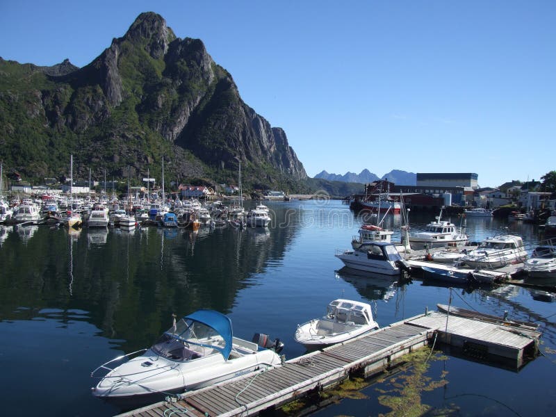 Boats in small harbor in Norway