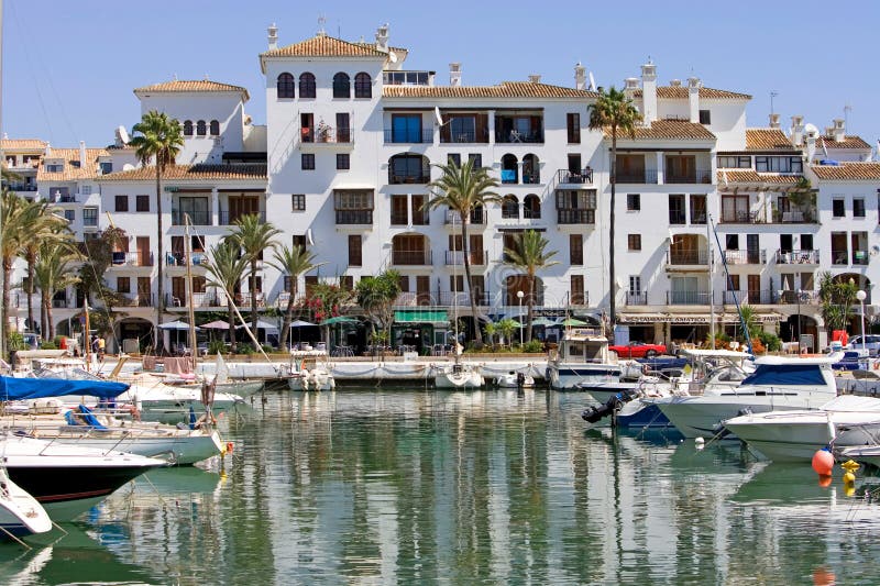 Boats And Yachts Moored In Duquesa Port In Spain On The Costa De Stock
