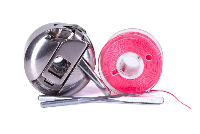 Bobbin Case, Plastic Bobbin and Sewing Needles Stock Image - Image of ...