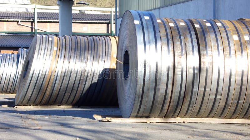 Rows of Steel Coils at an industrial Factory Stockyard. Rows of Steel Coils at an industrial Factory Stockyard