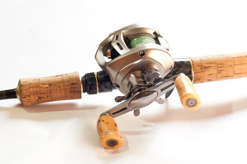 The low-proflile casting reel with rod. The low-proflile casting reel with rod