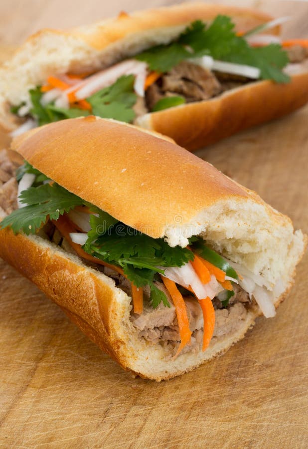 Bocadillo vietnamita del cerdo de Banh MI foto de archivo libre de regalías Bocadillo vietnamita del cerdo de Banh MI foto de archivo libre de regalías