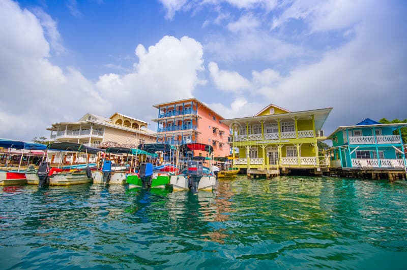 BOCAS DEL TORO, PANAMA - APRIL 23, 2015 : Bocas Town, a hub for dining, shopping and nightlife, with reggae music emanating from open-air bars. BOCAS DEL TORO, PANAMA - APRIL 23, 2015 : Bocas Town, a hub for dining, shopping and nightlife, with reggae music emanating from open-air bars