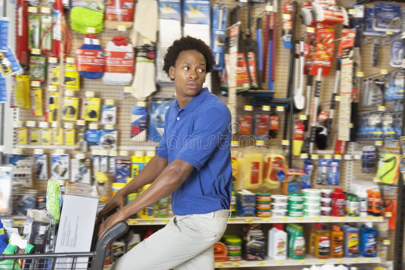 Side view of African American in hardware store. Side view of African American in hardware store