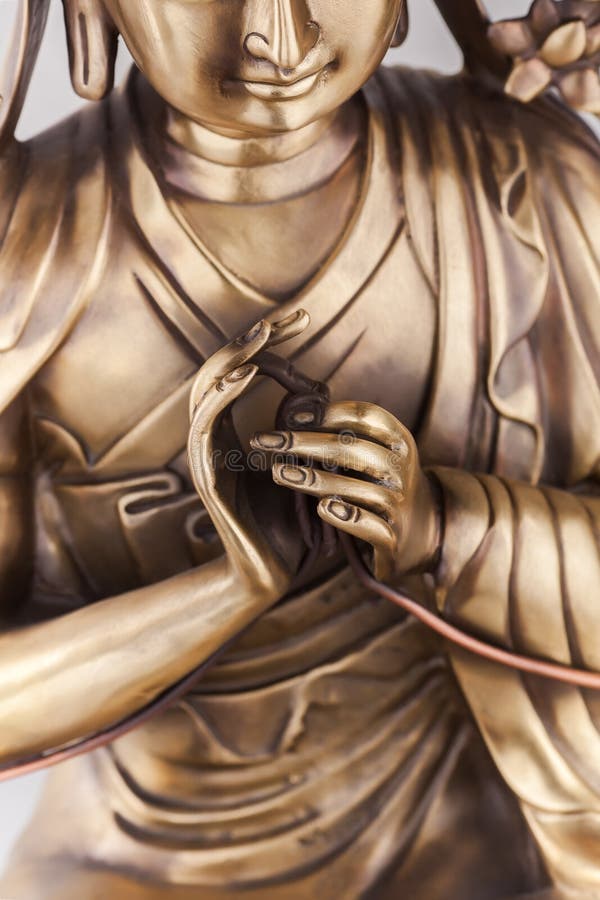 Bodkhisattva Avalokiteshvara sits in a pose of meditation.