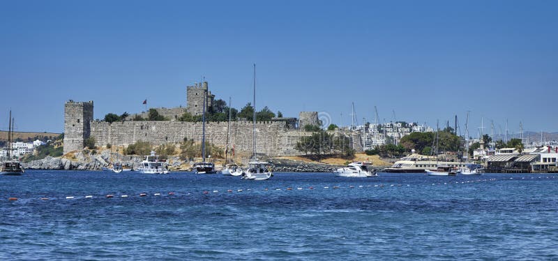 Bodrum, Turkey, Aegean Sea, view of a city, an embankment with restaurants and the old castle of St. Peter. Seascape