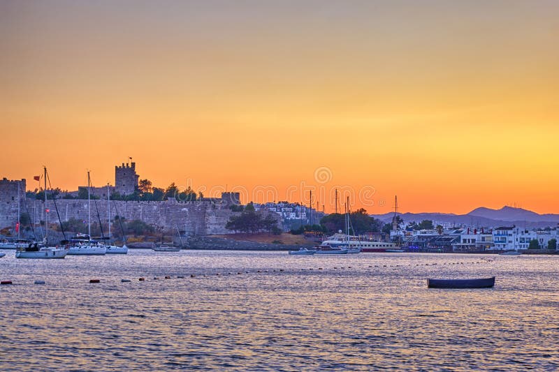 Bodrum, Turkey. The castle of St. Peter, Marina and the City Beach with cafes and restaurants on the embankment. Night landscape