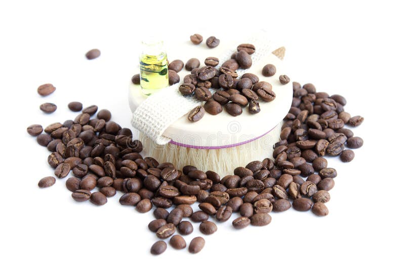 Body Brush, Coffee Beans and Oil on White Background Stock Image