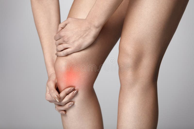 Body Pain. Close-up Of Beautiful Female Body With Pain In Knees