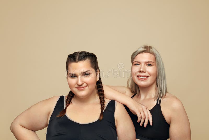 Plus Size Models. Full-figured Women in Black Bodysuits Full-length  Portrait. Brunette and Blonde Posing on Beige Background Stock Image -  Image of concept, female: 183623255