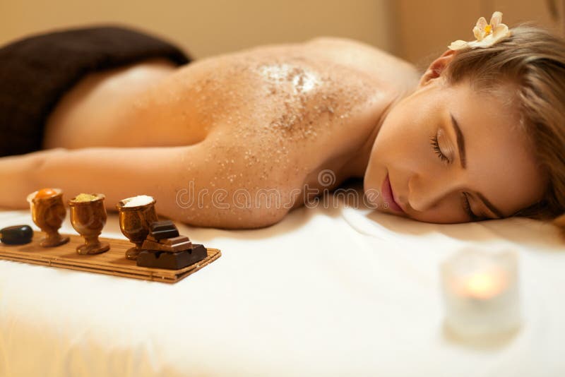 Body Scrub. Beautiful Blonde Gets a Salt Scrub Beauty Treatment