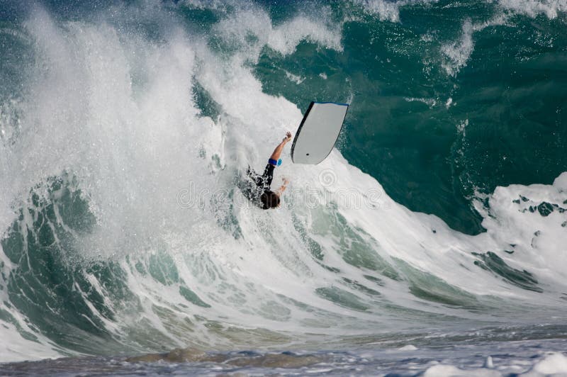 Bodyboarder élimine photos stock