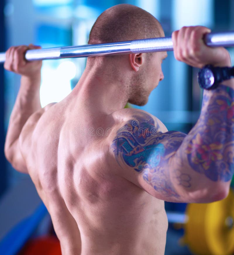 Bodybuilder with Barbell in Gym Stock Photo Image of club, sports