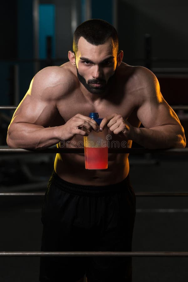 Bodybuilder Drinking Water from Shaker Stock Photo Image of muscle