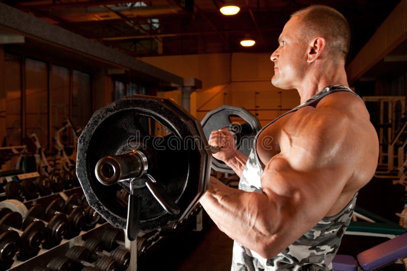 Bodybuilder in training room