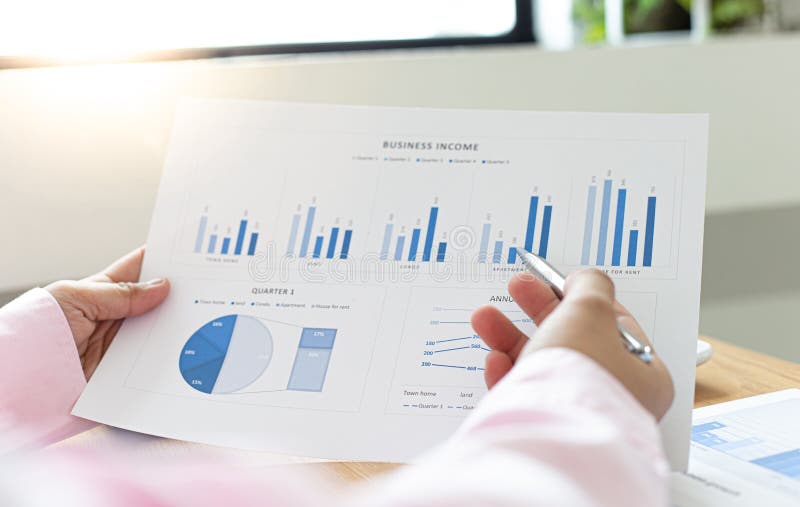 Accounting businessman are calculating income-expenditure and analyzing real estate investment data, Dedicated to the progress and growth of the company, Financial and tax systems concept. Accounting businessman are calculating income-expenditure and analyzing real estate investment data, Dedicated to the progress and growth of the company, Financial and tax systems concept