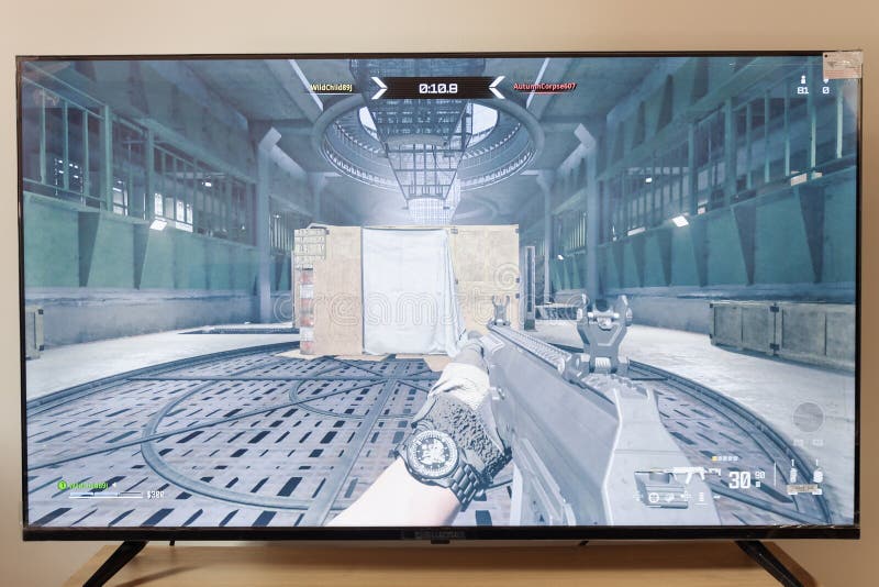 Warzone call of duty 2023 edition battle royal first person view of a gulag of urzikistan map in an android smart tv royalty free stock photos