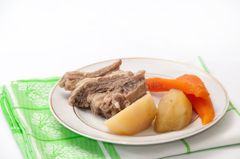 Boiled Beef with Boiled Potatoes and Carrots on a Plate Stock Photo