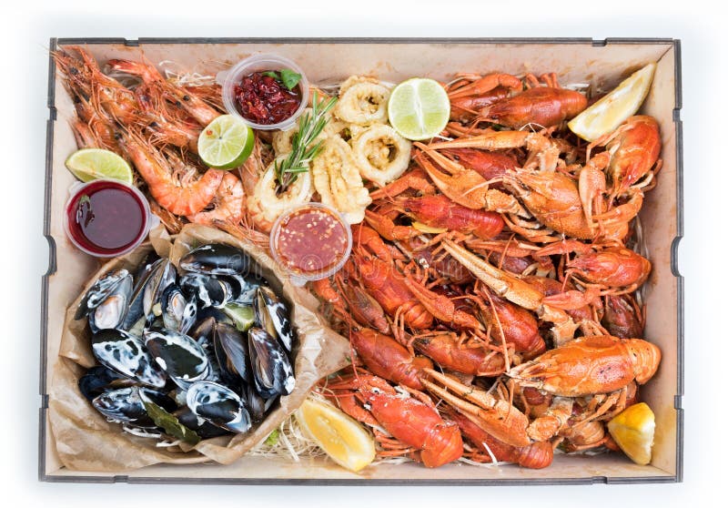 Boiled crawfish, mussels, shrimps with sauces royalty free stock photo Boiled crawfish, mussels, shrimps with sauces royalty free stock photo