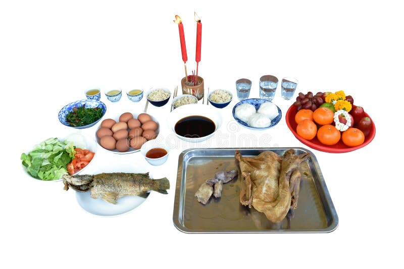 Boiled duck with fried bass fish and food for offering ancestor in Chinese new year or other festival on white background. Boiled duck with fried bass fish and