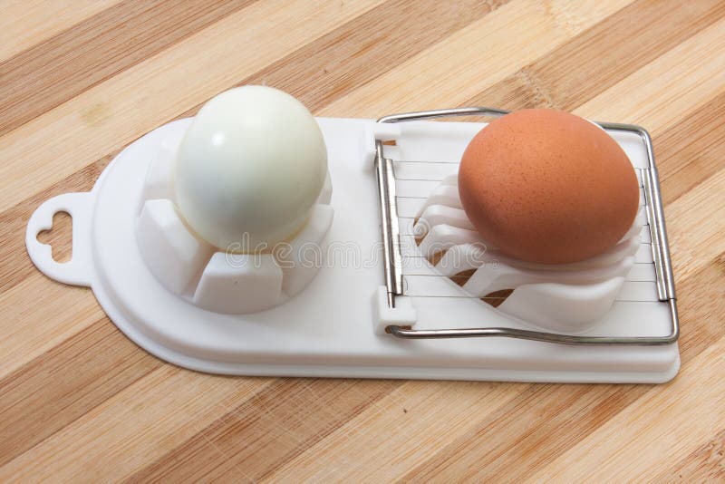 Boiled Egg on the Egg Chopper Stock Photo Image of chopped, housing