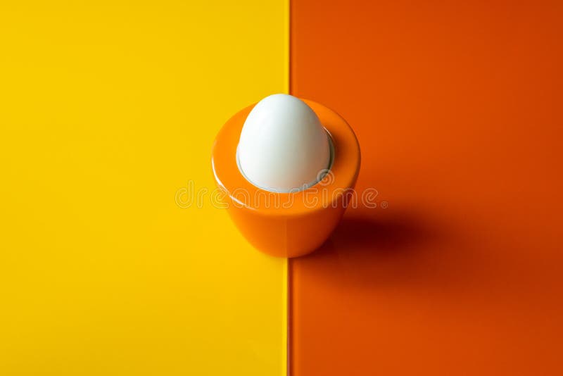 Boiled Egg on a Yelloworange Background, Original Design
