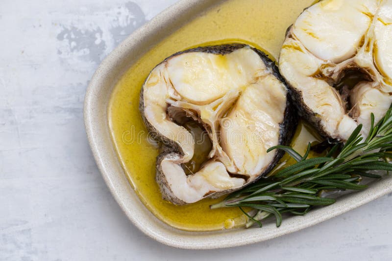 Boiled Fish With Rosemary And Olive Oil In Dish Stock Image Image of