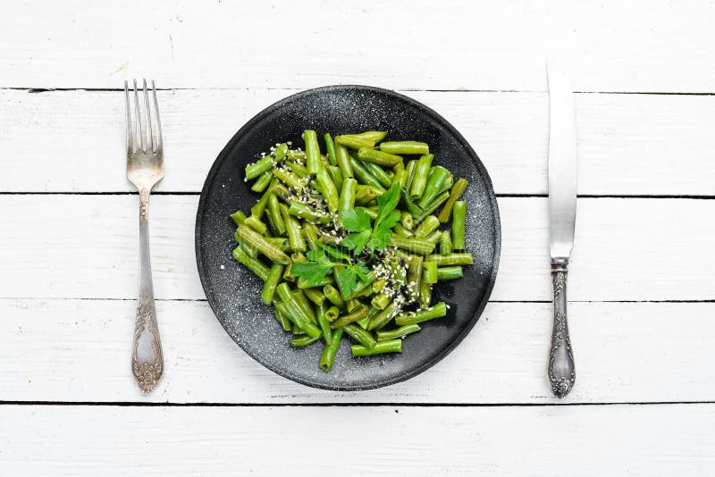 Boiled Green Asparagus Bean. in a Black Plate. Top View Stock Image