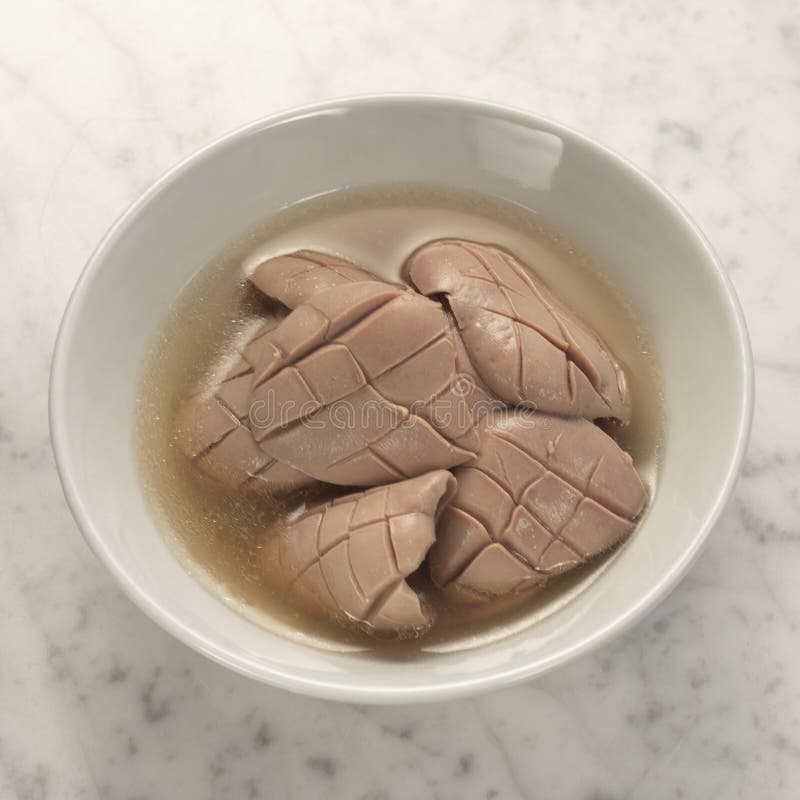 Boiled kidney in soup. Traditional boiled kidneys in pepper soup soya sauce side dish in singapore and malaysia for bak kut teh, pork rib soup stomach royalty free stock photos Boiled kidney in soup. Traditional boiled kidneys in pepper soup soya sauce side dish in singapore and malaysia for bak kut teh, pork rib soup stomach royalty free stock photos