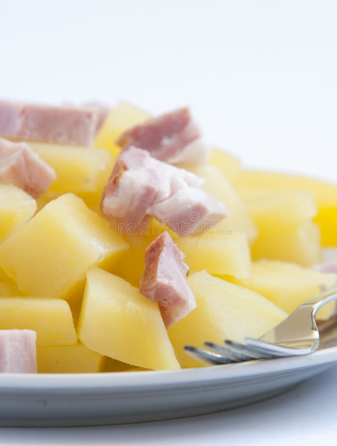 Boiled potatoes with bacon