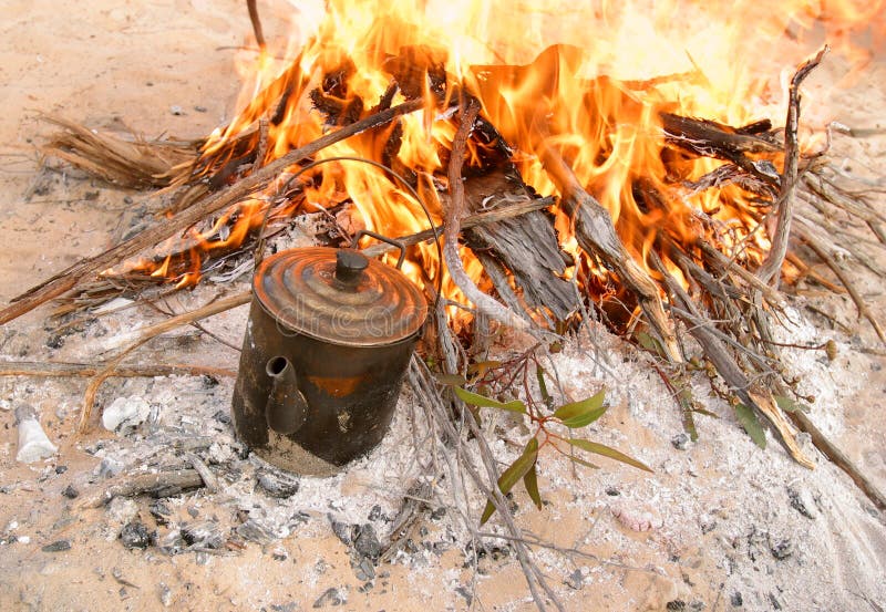 Boiling water in a tin can called a Billy. Camp fire in outback Australia. Boiling water in a tin can called a Billy. Camp fire in outback Australia.