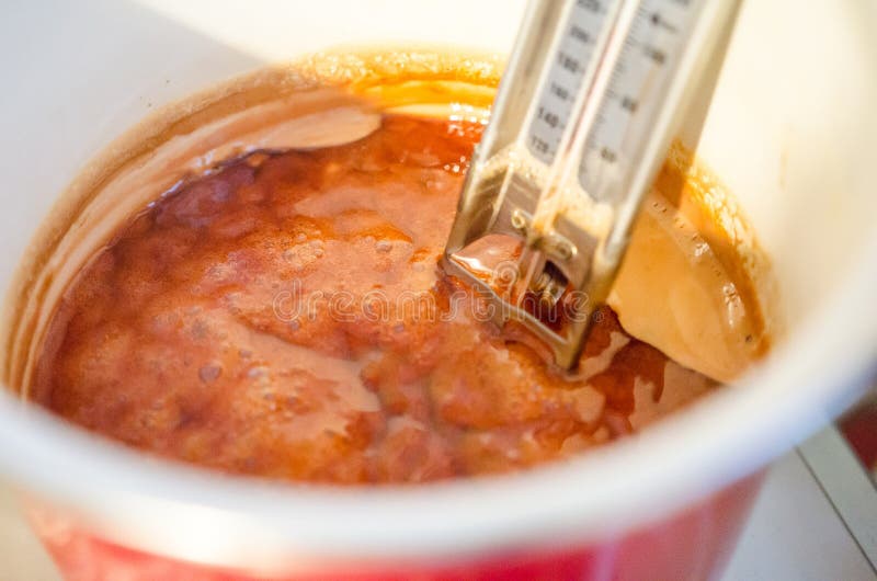 Boiling medlar jelly